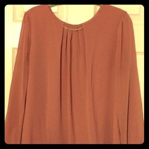 Soft chiffon blouse with a light shade of coral
